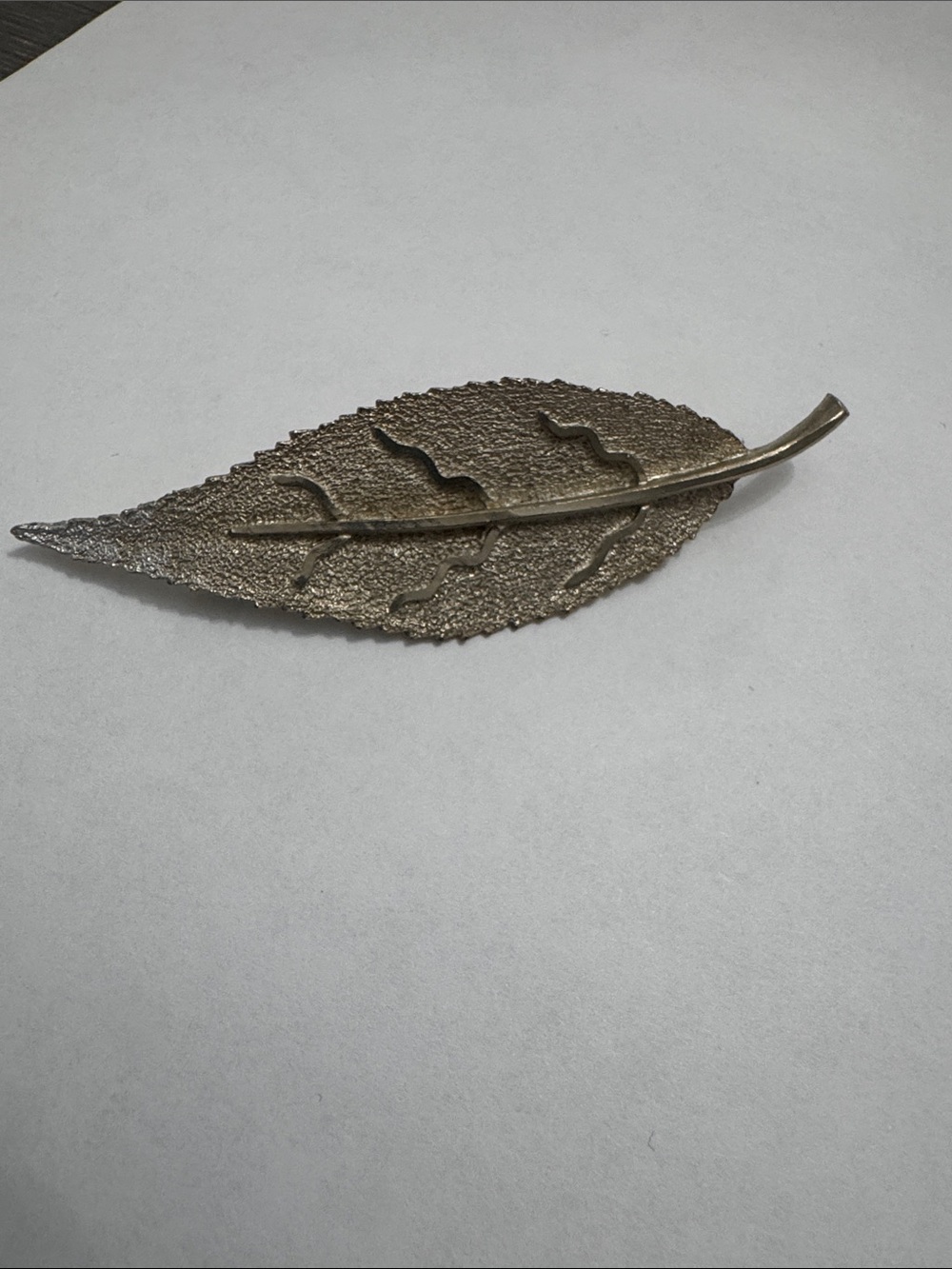 vintage silver-tone textured leaf brooch signed by BSK